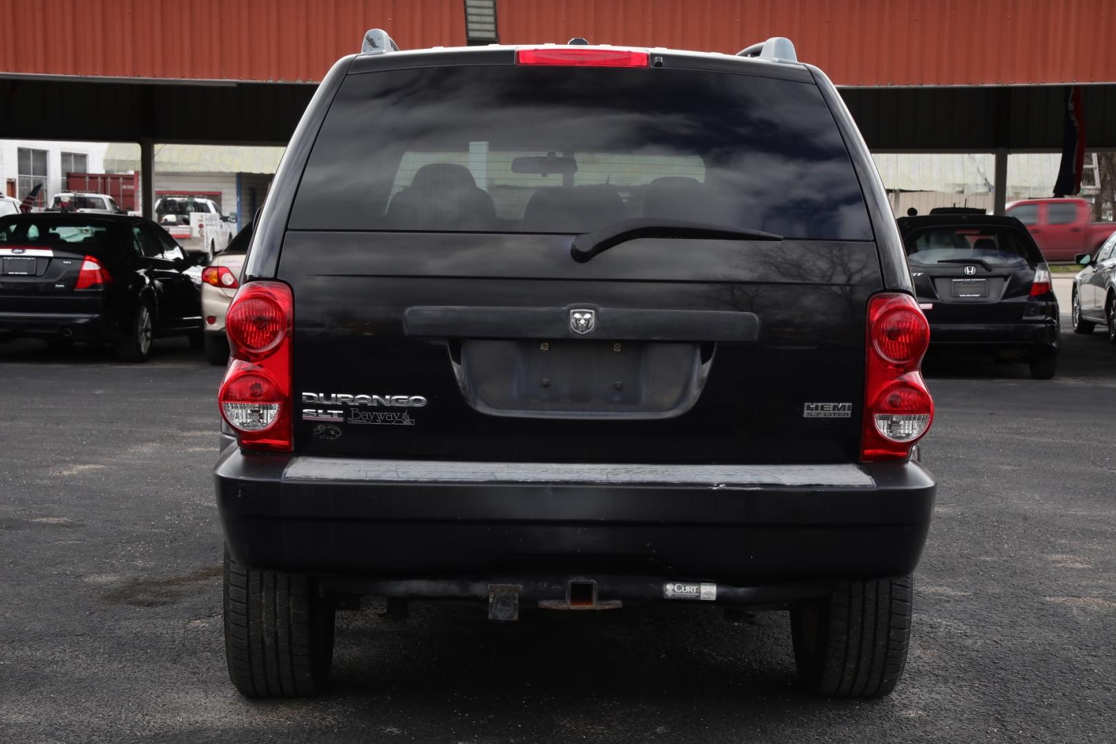 2007 BLACK DODGE DURANGO SLT 2WD (1D8HD48207F) with an 5.7L V8 OHV 16V engine, 4-SPEED AUTOMATIC OR 5-SPEED AUTOMATIC transmission, located at 420 E. Kingsbury St., Seguin, TX, 78155, (830) 401-0495, 29.581060, -97.961647 - Photo#5